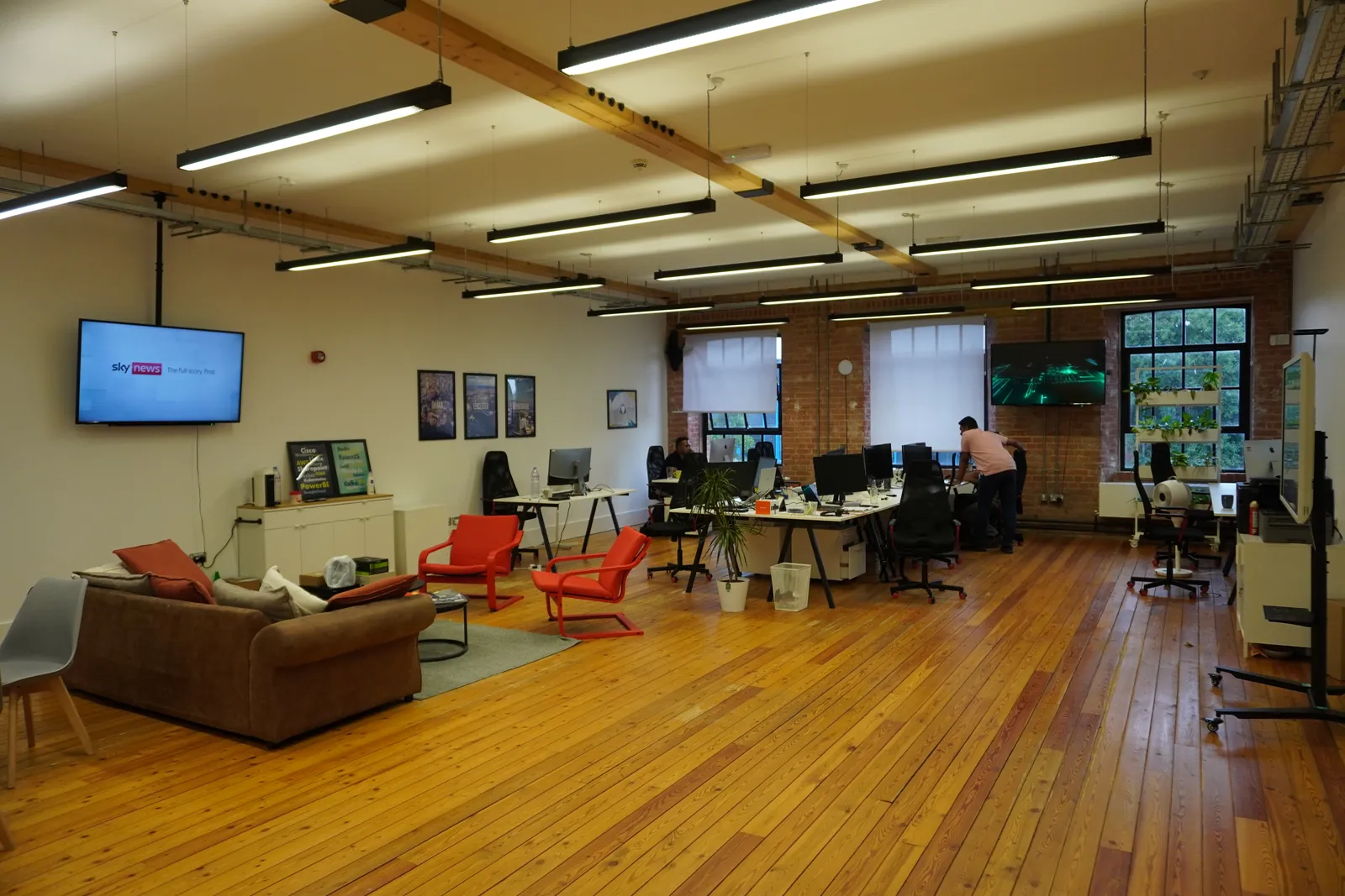 The TulipTech Leicester office at Friars Mill with desks, sofas and exposed brick
